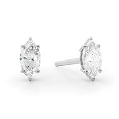 Show off your elegant taste in style when you wear these petite marquise-cut diamond solitaire stud earrings in white gold. Fashioned in 14K white gold Each earring showcases a 1/6 ct. marquise-cut diamond solitaire. Perfect for layering and stacking with other earring styles Radiant with 1/3 ct. t.w. of diamonds These post earrings secure comfortably with friction backs. Earring Styles, Solitaire Studs, Marquise Cut Diamond, Marquise Cut, Diamond Solitaire, Post Earrings, Fashion Earrings, Diamond Cuts, Layering