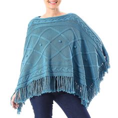 Knit from 100% cotton in a solid cerulean hue, this charming poncho is created by artisan duo Ying and Joy in Thailand. Elaborate patterns decorate the chest while cable-knit designs accentuate the top and bottom of this piece, which is completed with long fringe. Blue Cozy Poncho One Size, Cable Knit Poncho One Size, One Size Cable Knit Poncho, Winter Blue Knit Poncho, Old Factory, Small Clothes, Garment Factory, Long Fringe, Long Fringes