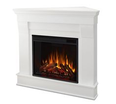 a white fireplace with flames in it