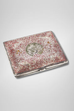 Add charm to your collection with this exquisite silver enamel peacock cigarette case. Its intricate alpaca goat details and timeless elegance make it a unique gift or keepsake. A perfect blend of style and history. #vintagefinds #artsyantiques #businessaccessories Silver Design, Vintage Elegance, Silver Enamel, Vintage Finds, Alpaca, Timeless Elegance, History, Silver