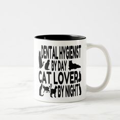 two white and black coffee mugs with words on them that read electrical engineer by day, cat lover by night