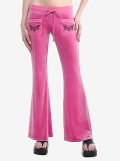 Bring back the 2000s with these pink velvet  low-rise  slightly flared lounge pants! From Sweet Society  they're decorated with black glitter butterflies on two front hip pockets and across the back. Drawstring  elasticated waist.97% rayon; 3% spandexWash cold; dry lowImportedListed in junior sizesModel is 5'10"Model wears size Small Sweet Society, Girls Lounge, Downtown Girl Coquette, Glitter Butterflies, Girls Loungewear, Big Sweater, Lounge Clothes, Feminine Masculine, Big Pants