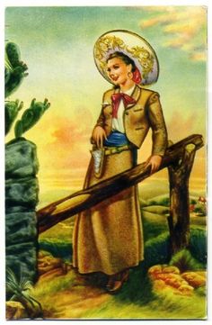 a woman standing next to a cactus holding a watering can and wearing a hat on top of her head