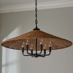 a chandelier hanging from a ceiling in a room