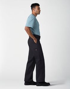 Any job is easier with Dickies’ Loose Fit Double Knee Work Pants, that work with you at a great value. Your knees don’t need back-up for blow outs because there’s a fabric reinforcement that keeps you covered. These work pants have a roomy fit in the seat and thigh that makes bending and kneeling more comfortable, while the polyester/cotton blend spells durability at a value. Multi-use pockets on the leg and back are a nice supplement to the heavy-duty belt loops that hold even the heaviest tool Workwear Pants With Side Pockets, Black Utility Work Pants, Black Straight Leg Dress Pants With Pockets, Black Utility Pants With Welt Pockets, Black Utility Bottoms With Welt Pockets, Work Pants With Cargo Pockets, Full-length Cargo Work Pants, Full Length Work Pants With Cargo Pockets, Black Full-length Work Pants With Side Pockets