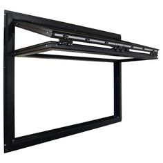 an open window on the side of a white wall with black metal bars and brackets