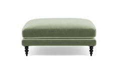 a green ottoman with black legs on a white background