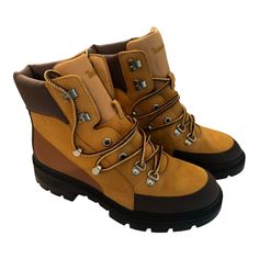 Elevate Your Outdoor Adventures With These Timberland Women's Cortina Valley Waterproof Mid Hiker Boots In A Beautiful Wheat Nubuck Color. These Boots Feature A Round Toe, Hook & Loop Closure, And A Block Heel Style. The Shoe Shaft Style Is Mid-Calf, With A Medium Calf Width, And Is Perfect For Any Occasion, Whether It's Travel, Activewear, Casual, Or Workwear. The Boots Are Made With A Blended Fabric Type And A Rubber Outsole Material, Making Them Waterproof And Durable. They Also Have Embroide Timberland Hiking Boots For Fall, Timberland Brown Hiking Boots For Fall, Casual Brown Timberland Waterproof Boots, Brown Timberland Waterproof Boots For Fall, Timberland Brown Hiking Boots For Winter, Brown Timberland Hiking Boots For Winter, Womens Sneaker Boots, Timberland Ankle Boots, Timberland Hiking Boots