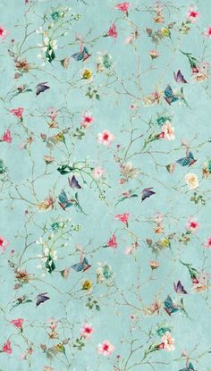 a blue wallpaper with flowers and butterflies on the back ground, all in different colors