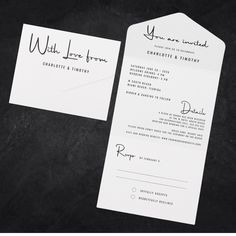 the wedding stationery was designed to look like an envelope and it is white with black ink