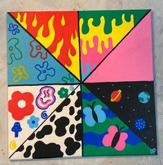 an art piece with different colors and designs on the bottom, including black, white, pink, blue, green, yellow