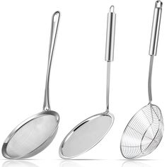 three stainless steel kitchen utensils on a white background