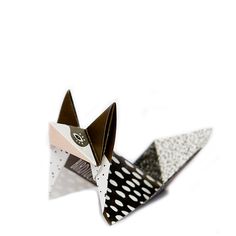 an origami cat is shown on a white background