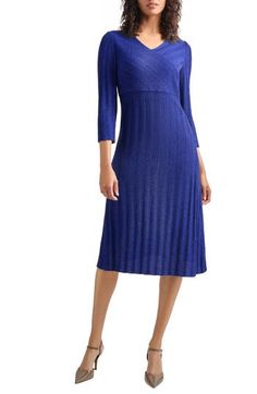 Step out in this sweater-dress decorated in textural stripes and designed in a timeless A-line silhouette that's perfect for any occasion. Surplice V-neck Three-quarter sleeves 56% acrylic, 33% nylon, 11% polyester Machine wash, dry flat Imported Chic A-line Ribbed Dress, Chic Ribbed A-line Dress, Elegant Jacquard Knit Midi Dress, Elegant Fitted Textured Knit Sweater Dress, Formal Fitted Jacquard Knit Dress, Elegant Formal Spring Sweater Dress, Elegant Formal Sweater Dress For Spring, Elegant Ribbed Evening Dress, Spring Formal Ribbed Dress