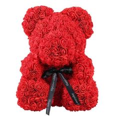 a red teddy bear made out of roses