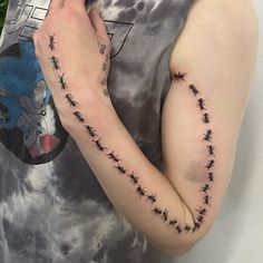 a person with a tattoo on their arm