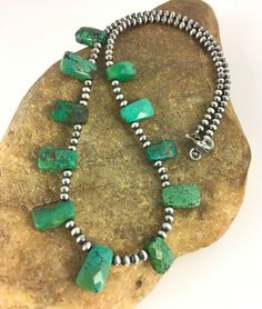 Masha Indian Native American Jewelry   -On Route 66 -         Albuquerque, New Mexico U.S.A     Item Specifics            Stone : Turquoise Size : 20" Color : Green SKU : 8867 Free gift with Purchases (Till Stocks Last)  Genuine Sterling Silver Jewelry  This beautiful Necklace is made from all 925 Sterling Silver Beads and Findings.  These Beads are meticulously hand strung and assembled by the artist creating the perfect balance of fall, color and shine. Necklaces are a must have for any collection, whether you are just starting out or are a serious collector you will not be disappointed with this work of art. These necklaces have excellent fall and can even be stacked with others, fashioned with a pendant or worn double wrapped to give you different look every time.    Authenticity you c Southwestern Green Turquoise Necklace, Antique Turquoise Jewelry, Turquoise Necklaces, Artisan Jewelry Necklaces, Antique Turquoise, Albuquerque New Mexico, Southwestern Jewelry, Handcrafted Artisan Jewelry, Fall Color