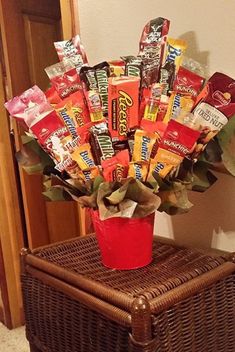 a basket filled with candy sitting on top of a table