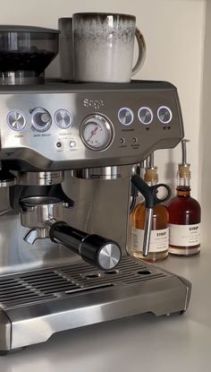 an espresso machine sitting on top of a counter