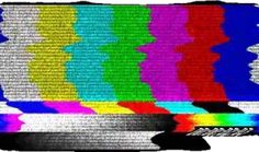 an old tv screen with colorful lines on it