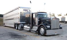 a large semi truck parked in a parking lot