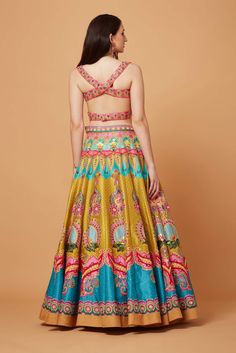 Editor's Note Lime Mustard Paradise Blue Oversized Floral SB Signature Embroidered Lehenga, Bustier Cut Blouse With Powder Pink Net 3D Embroidered Scallop Dupatta. Fabric: Dupion, Net Color: Lime Mustard, Blue Care: Dry Clean Only Disclaimer: Product Color May Slightly Vary Due To Photographic Lighting Sources Or Your Monitor Setting. About the Designer Siddhartha Bansal, label epitomise its design philosophy touring around " Golden bird" nation to present day India, in the wanderlust for rich C Lehenga Pattern, Blue Lehenga, Embroidered Lehenga, Lehenga Blouse, Yellow Blouse, Net Dupatta, Mandala Pattern, Powder Pink, Sweetheart Neck