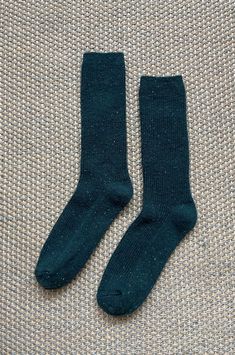 An essential sock to pair with all your winter footwear staple in colder months. The extra length can be worn up for an added layer of warmth from the wool blend yarn scrunched or folded with your favorite booties. Details 54% Wool, 5% Silk, 9% Cotton, 22% Nylon, 8% Polyester, 2% Spandex One size fits most (US Women's size 6-10) Made in South Korea Classic Solid Winter Socks, Classic Winter Socks, Warm Socks For Stocking Stuffer In Fall, Comfortable Wool Socks For Fall, Comfortable Soft Knit Winter Socks, Comfy Cozy Fit Socks For Fall, Thick Solid Winter Socks, Warm Comfortable Socks For Fall, Warm Comfortable Fall Socks