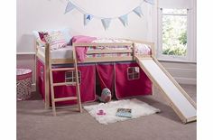 a child's bedroom with bunk bed and slide