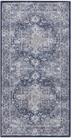 a blue and white rug with an ornate design