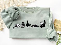 This sweatshirt is made of high quality cotton weave, advanced embroidery technology to ensure bright colors and detailed patterns, unisex and soft and comfortable. Sweatshirt makes for an edgy, casual style. Each sweatshirt has a unique aesthetic, and is a gift that will not go out of style for your own family, friends, or teachers. Size We offer a variety of colors and different sizes, you can choose your favorite and size, we recommend that you use the size of the potential better fit or loose size, if you like a tight fit can be selected according to the size, if you have any special requirements, please give me a message! Maintenance Wash from inside to outside with cold water and dry with a low-speed tumble dryer. Please do not dry clean. Do not rub the embroidery pattern with force. Cotton Crew Neck Sweater With Cat Design, Cat Design Cotton Long Sleeve Sweatshirt, Cotton Crew Neck Sweatshirt With Cat Design, Black Cotton Sweatshirt With Cat Design, Embroidered Cat, Advanced Embroidery, Disneyland Shirts, Hoodie Allen, Embroidery Hoodie