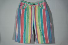 "Here's a great pair of colorful pastel colors cotton denim jean, quality tailored shorts by the high end Stuffed Shirt 80's / 90's vintage collector's made in U.S.A . label. You will love knocking about in these unique figure flattering vertical striped, medium rise summer long shorts! They are great for all outdoors activities and have a very original look and eye-catching appeal. They are in really great condition, too! Check out the photos and measurements and get this really great original Retro Cotton Shorts For Spring, Multicolor Fun Shorts For Spring, Fun Multicolor Shorts For Spring, Fun Multicolor Spring Shorts, Vintage Multicolor Bottoms For Spring, Fun Cotton Shorts For Spring, Rainbow Cotton Shorts For Summer, Multicolor Fun Bottoms For Spring, Fun Spring Bottoms With Pockets