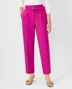 Elevate your wardrobe with the sophisticated charm of Ann Taylor's Belted Taper Pants in Magenta Shadow. These pants are designed to flatter with a high-rise, belted waist and a sleek tapered leg that narrows at the ankle, ensuring a polished silhouette.

- Size: 6 Regular
- Color: Magenta Shadow
- Material: 79% Polyester, 17% Rayon, 4% Spandex
- Gender: Female
- Fit: Tailored and fitted
- Rise: High rise
- Length: Hits at ankle; 27" inseam with 15 1/2" leg opening
- Features: Front zip with dou Spring Tapered Pants With Belt Loops, Spring Tapered Leg Bottoms With Belt, Low Sandals, Getaway Dress, Work Sweaters, Queen Outfit, Knitted Suit, Color Magenta, Kitten Heel Sandals