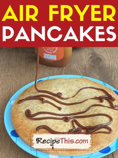 a cake with chocolate icing on top and the words air fryer pancakes above it