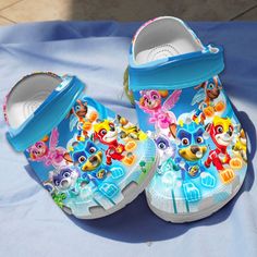 Cool Design Crocs Paw Patrol Squad Blue Clogs, Suitable Footwear for Kids And Adults Synthetic Slip-on Clogs For Playtime, Cute Blue Non-slip Clogs, Cute Synthetic Clogs For Playtime, Non-slip Plastic Slip-on Clogs, Playful Slide Clogs For Beach, Playful Plastic Clogs For The Beach, Playful Plastic Clogs For Beach, Playful Plastic Beach Clogs, White Non-slip Clogs For Playtime