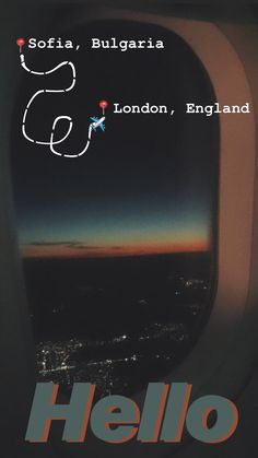 an airplane window with the words hello written in red and blue on it's side