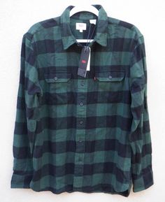 Heavyweight Note- This particular Levi's flannel is thick and well made.  It weighs just under 15 ounces unlike thin cheaply made one's which are easily under 12 ounces for a similar size.   Brand New With Tags Men's Levi's Heavyweight Green Plaid Long Sleeve Flannel Shirt.  MSRP $59.50.  Size- men's large.   Overall measurements= length(top middle of back collar to bottom of the shirt)- 31" / chest(armpit to armpit laying flat)- 22" / sleeve(armpit to end of sleeve)- 20".   Flannel shirt features a full button up front, 2 single button chest pockets and single button cuffs.  Levi's shirt is 100% real and not a cheap low quality overseas fake.  Flannel shirt was personally bought by me from a large national retailer here in the United States.  I absolutely did not buy any of my Levi's prod Levis Shirt, Long Sleeve Flannel, Low Quality, Green Plaid, Levis Men, Flannel Shirt, Chest Pocket, Overalls, Button Up