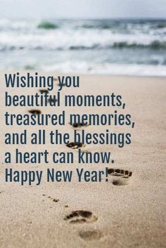 footprints in the sand with a quote about happy new year on it that says wishing you beautiful moments, treasure memories, and all the blessings