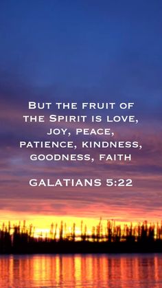 a sunset with the words galatians 522 and an image of trees in the background