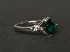 Welcome to my shop, you can find many beautiful gemstone jewelry here, and you also can ask for customized service. Main Stone: lab emerald, square cut, measures 7x7mm, weights about 1.62 carats Accent Stones: cz Metal: 925 sterling silver plated with rhodium. I also can provide metal options such as 14k solid yellow/white/rose gold Setting: prong setting more rings: https://www.etsy.com/shop/XCjewelryStudio?ref=hdr_shop_menu It's a perfect gift for the person who was born in May (Birthstone), i Born In May, January Birthstone Rings, May Birthstone Rings, June Birthstone Ring, Oval Cut Engagement Ring, Ring Emerald, May Birthstone, Emerald Engagement, Emerald Jewelry