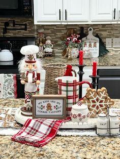 the kitchen counter is decorated with gingerbread cookies