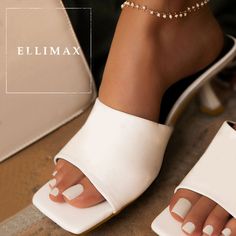 Easily Elevate Any Outfit With These White Slide Sandals, Soft And Sleek Faux Leather Shapes A Squares Peep-Toe Upper Atop A Beguilingly Curvy Heel. Cushioned Insole. With Its Trendy Slip-On Design, You'll Be Wanting To Wear These Sandals Non-Stop! *** Bundle Up To Get 10% Discount *** Condition: Brand New Color: White Heel Height: 2.75" (Approx) Fit: True To Size (Medium Width) White Mules With Heel Strap For Party, Party White Mules With Heel Strap, Trendy White Mules With Padded Heel, Trendy White Open Heel Mules, Trendy White Open Toe Mules, Trendy White Mules For Party, White Trendy Mules With Block Heel, Trendy White Mules With Block Heel, White Mules For Spring Party