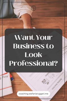 a person sitting at a desk with the words want your business to look professional?