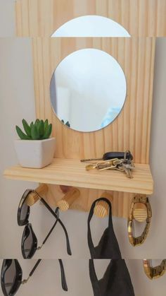 a mirror and some sunglasses on a shelf next to a potted succulent