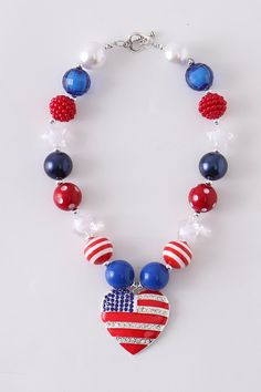 This necklace is perfect for the 4th of July or any day you want to show your patriotic spirit. Fashion tip: Always supervise children for chocking hazards when they are wearing necklaces. Cheap Patriotic Jewelry For 4th Of July, Cheap Jewelry For 4th Of July Party, Cheap Colorful Beads Jewelry For 4th Of July, Affordable Beach Jewelry For 4th Of July, Affordable Party Jewelry For 4th Of July, Cheap Patriotic Beaded Necklaces, Cheap Patriotic Jewelry With Round Beads, Cheap Multicolor Jewelry For Independence Day, Cheap Round Beads Jewelry For Independence Day