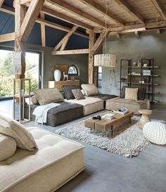 a living room filled with lots of furniture