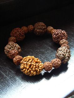 Rudraksha bracelet Meditation mala for men Shiva bracelet | Etsy Spiritual Hand-strung Beaded Bracelets For Rituals, Spiritual Beaded Bracelets For Festivals, Spiritual Brown Beaded Bracelets For Rituals, Spiritual Brown Rosary Bracelet For Meditation, Spiritual Rosary Bracelet With Round Beads For Meditation, Spiritual Brown Bracelet For Rituals, Bohemian Hand-strung Bracelets For Puja, Brown Bracelets For Meditation And Festivals, Spiritual Beaded Bracelets For Puja And Festivals