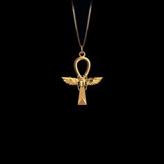 This solid gold key of Ankh necklace showcases exquisite craftsmanship, symbolizing life and spirituality. The key of Ankh pendant is more than just jewelry; it's a fine representation of ancient Egyptian elegance and the timeless allure of this sacred symbol. PENDANT INFORMATIONThis pendant is made of real, solid gold.• Made in USA• Size: MINI• Material: 14k or 18k solid gold• Finish: polished• Height: 1.14" (29 mm) x Width: 0.9" (22,5 mm)• Pendant weight (approx.): 3 grams (14k)• Bail: fits up Luxury Gold Ankh Necklace, Luxury Symbolic Ankh Necklaces, Luxury Spiritual Pendant Jewelry, Luxury Spiritual Pendant Necklace, Luxury Ankh Shaped Yellow Gold Necklace, Luxury Yellow Gold Ankh Necklace, Luxury Ankh Necklace As Gift, Luxury Ankh Necklace For Gift, Anhk Necklace Gold