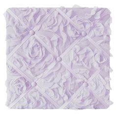 a purple wall with roses on it and squares around the edges that have been cut out