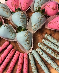 strawberries and chocolate covered strawberries arranged in a circle on top of a wooden table