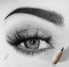 a pencil drawing of an eye with long lashes